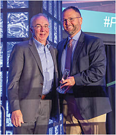 Figure 3. GSLS Award of Excellence: (left to right): Dr. Joe Barr (recipient), and Dr. Jason Nichols (presenter).