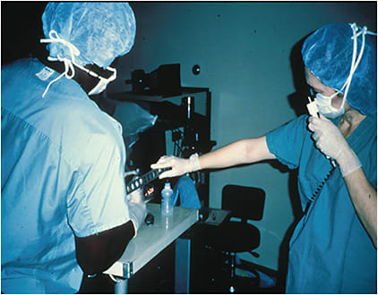 Dr. McDonald performing a retinoscopy on a monkey in the mid 1980s.IMAGE COURTESY MARGUERITE MCDONALD, MD