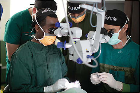 A SightLife clinical training faculty coaches a corneal surgeon on lamellar transplants in Ethiopia.