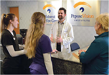 Pepose Vision Institute welcomes feedback from the staff. Here, Steven Branstetter, OD, speaks with (from left to right): Sarah Bowen, technician; Rylie Sell, technician; and Elena LaPlante, director of practice development.