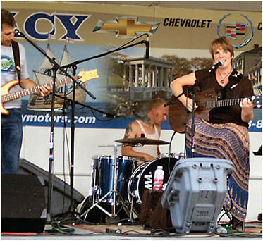 Ms. Malone (right) playing with Cat Man Mojo at The Plymouth Waterfront Music Festival. IMAGE COURTESY SHERRY MALONE