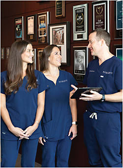 In discussion at Waring Vision Institute: Ms. VanDeWater (left), Ms. Stubing (center), and Dr. Waring.