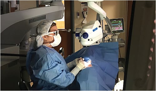 Figure 1. Dr. Yeu trials a digital surgical microscope. &#x201C;At the end of the day, I was much more comfortable than usual. I had less upper back/interscapular discomfort,&#x201D; she says.