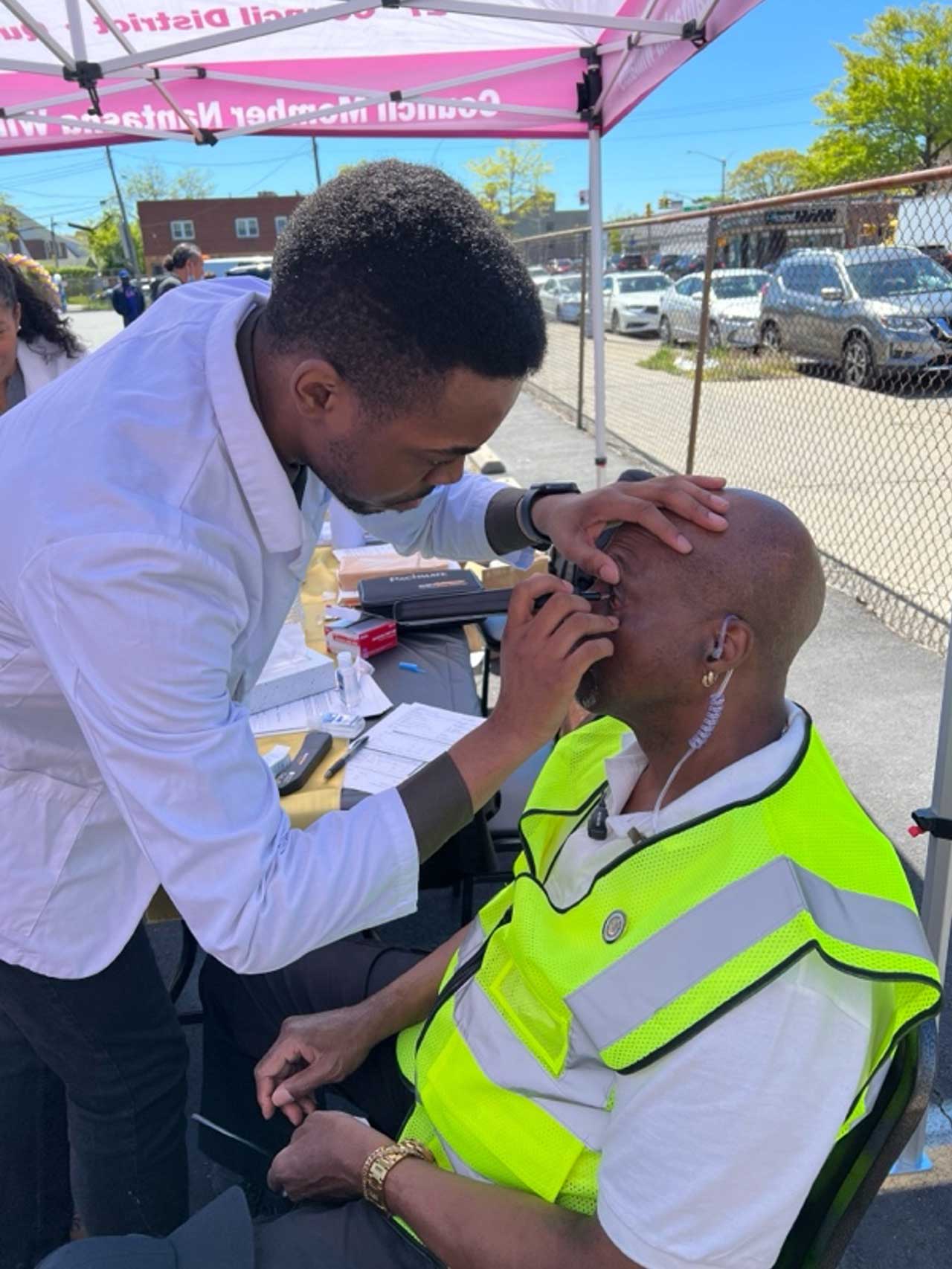 Figure 2. A second-year medical student participating in a glaucoma screening event