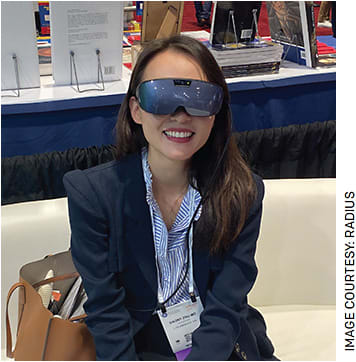 Dagny Zhu, MD, trying out the Radius XR portable vision diagnostic and patient engagement system.