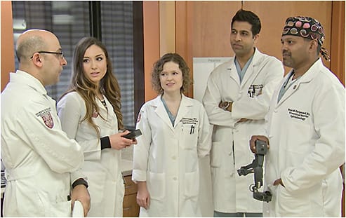 Dr. Hariprasad (right) prioritizes training the next generation. He is seen here rounding on an inpatient with two residents and two surgical retina fellows (left to right): Asadolah Movahedan, MD; Nicole Bajic, MD; Lilya Golas, MD; Raj Patel, MD.