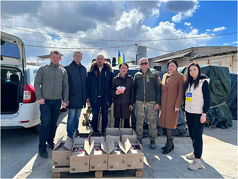 Dr. Chynn with Lutsk officials and organizers of the largest relief organization in Lutsk. Image courtesy: Emil William Chynn, MD, FACS, MBA