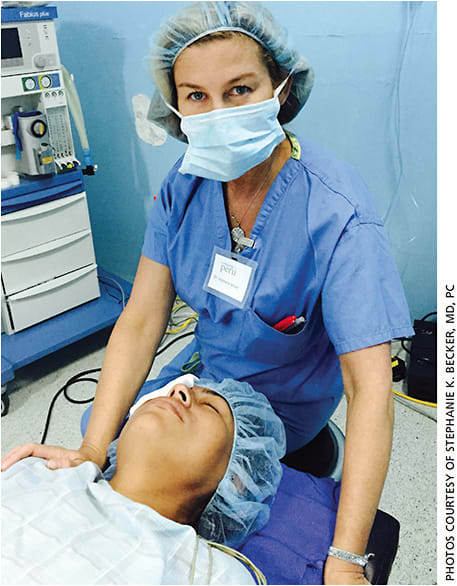 Stephanie K. Becker, MD, PC, prepares to operate on a patient as part of a volunteer trip with the group A Promise to Peru.