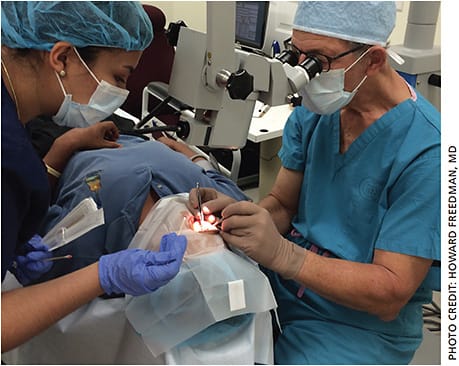 Howard Freedman, MD, performs pterygium surgery on a patient at the Florida Lions Eye Clinic in Bonita Springs, Fla.