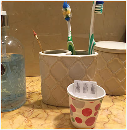 Figure 1. Simple visual cues, such as the “paper cup method,” can help dry eye patients remember to use their drops.