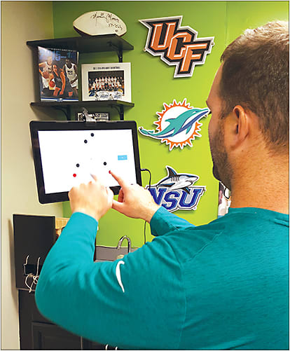 Optometric vision therapy may be warranted when chairside recommendations are unsuccessful at stopping the symptoms. Here, a post-concussion patient performs multi-object tracking. Courtesy of Amanda Nanasy, O.D.