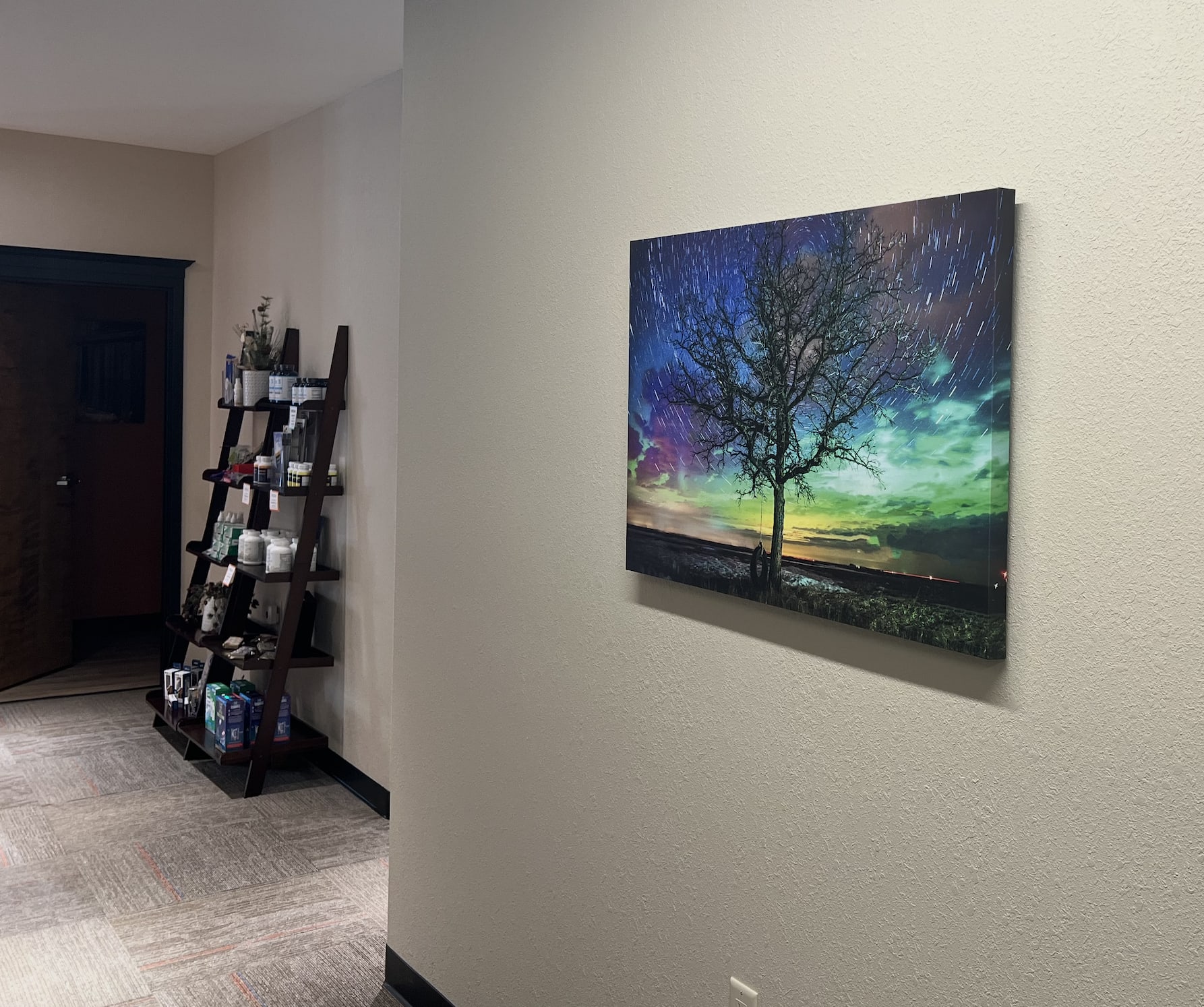 Even office décor can provide a feeling of calm. For example, we have large canvas prints by local photographers of the different seasons and the northern lights