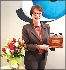 At a staff meeting in February, Dr. Bennett’s staff surprised her with flowers and a trophy to commemorate her 30 years in private practice.