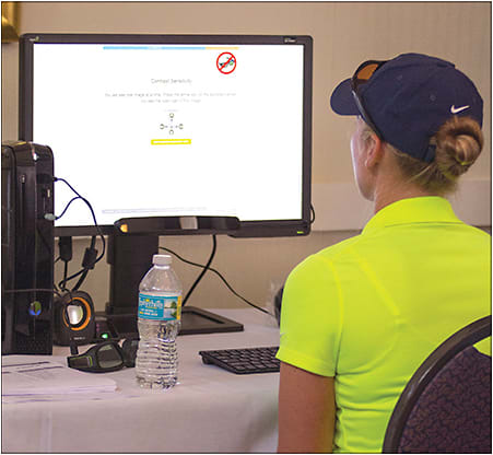 An athlete is instructed on contrast sensitivity on RightEye Performance Vision Tests.
Courtesy of Jayson Teig/High Performance Vision Associates