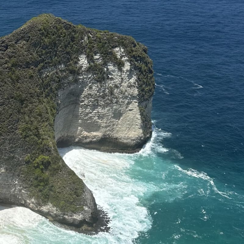 Tranquil black sand beach at Lovina, Bali