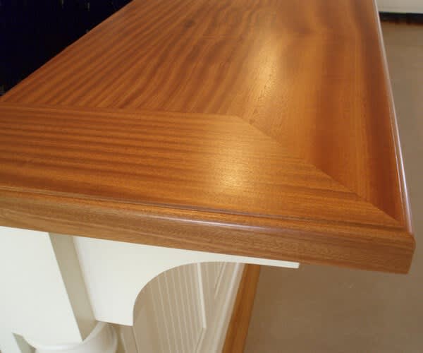 2" thick mahogany premium wide plank countertop. Natural color with Marine Oil Finish and an ogee-P edge.