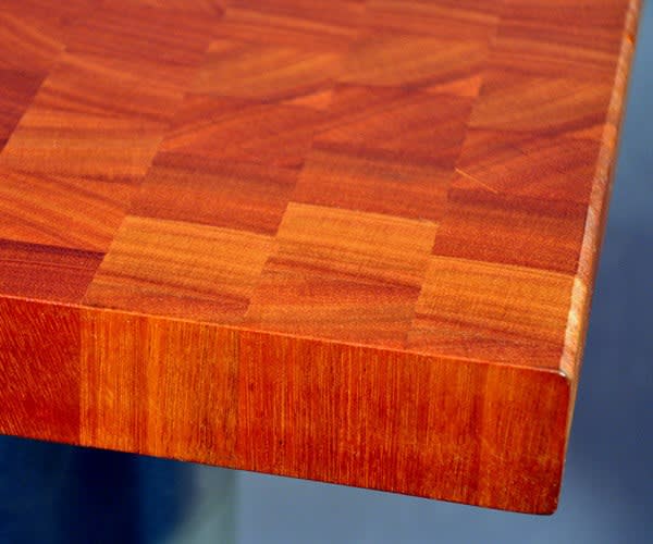1 1/2" thick lyptus end grain butcher block. Natural color, sealed and oiled with an eased-square edge.
