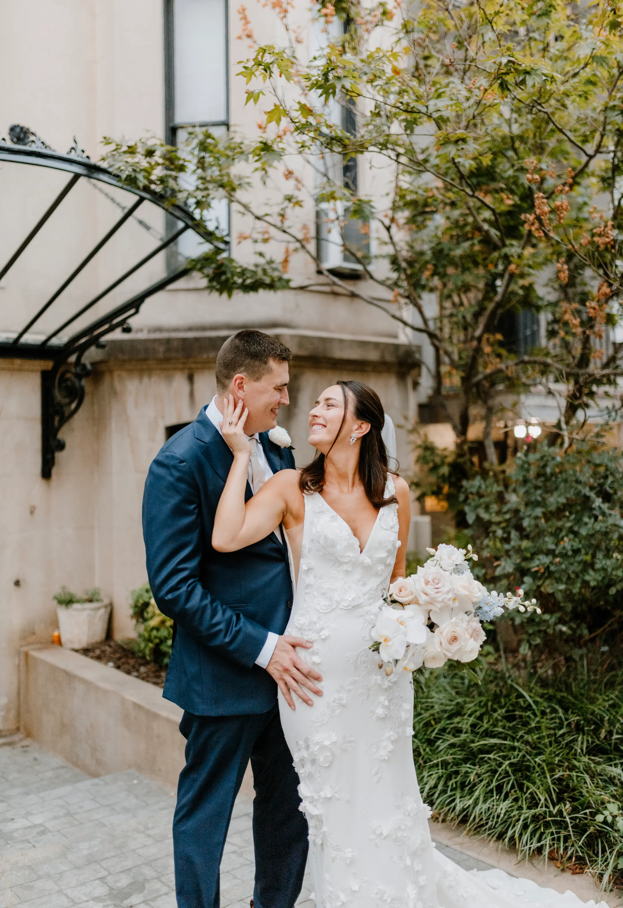 Newly wed couple posing at wedding venue in Washington, DC.