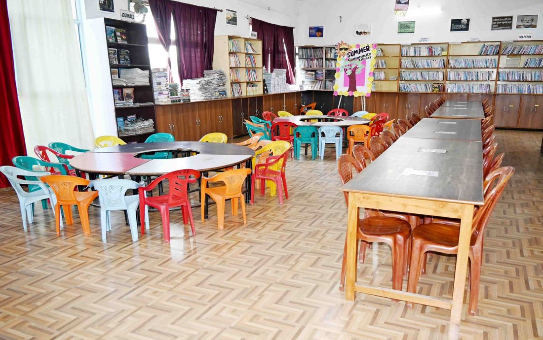 The Nalanda Library at Sunbeam School Ballia, its shelves signed by subject and its reading tables set out