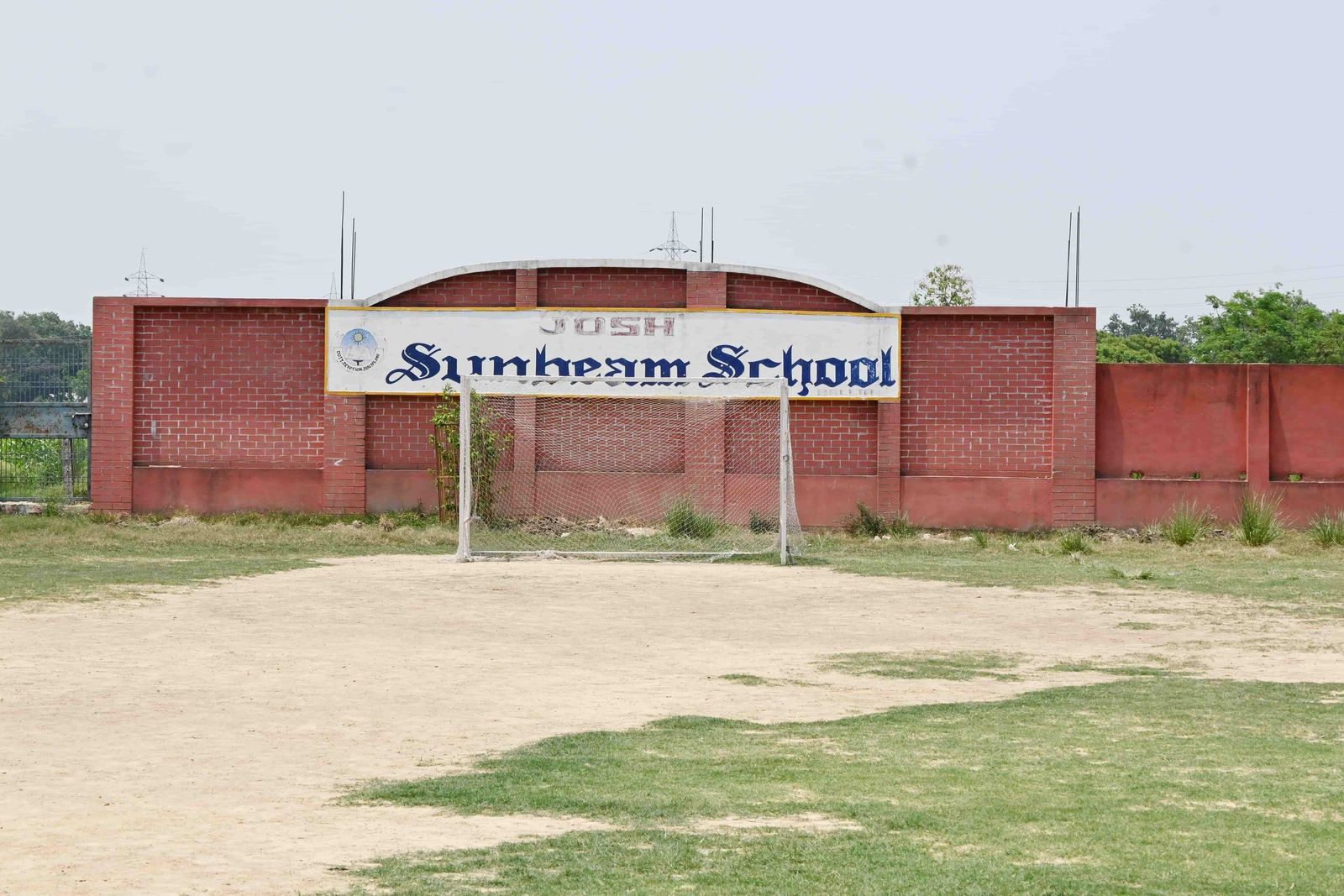 The JOSH ground at Sunbeam School Ballia, seen through the school gateway arch
