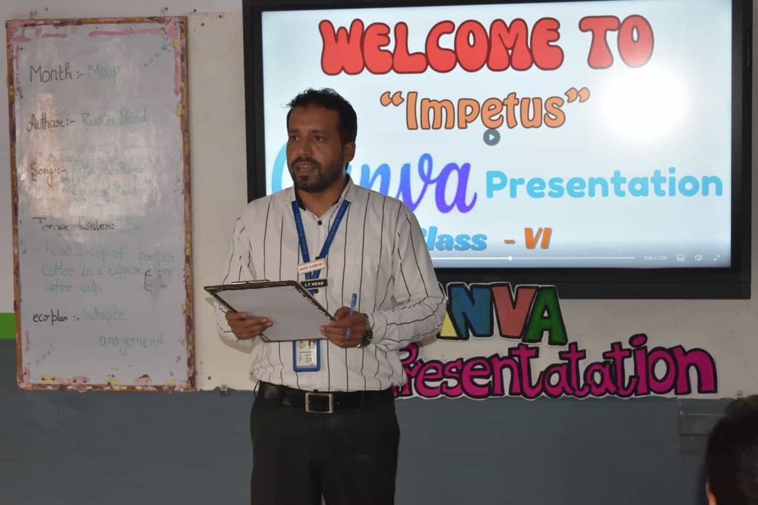 A teacher at Sunbeam School Ballia introducing the Impetus Canva Presentation session at the interactive board