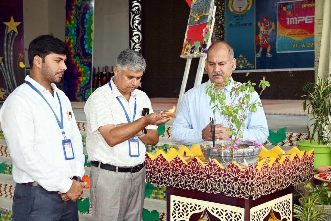 Staff of Sunbeam School Ballia lighting the lamp at the inauguration of the Impetus programme