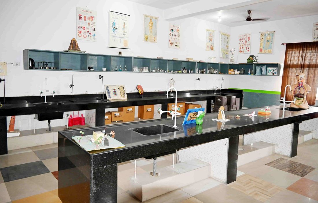 The composite laboratory at Sunbeam School Ballia, apparatus set out along the benches