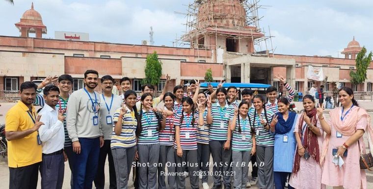 Sunbeam School Ballia students painting live at Ballia railway station — photograph 4 of 4