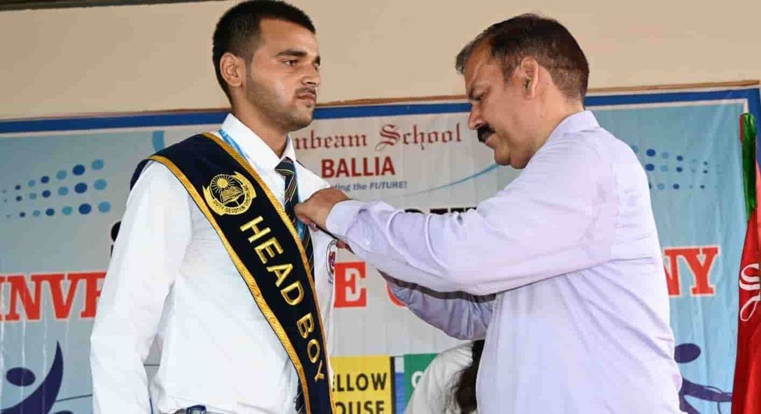 A student of Sunbeam School Ballia being invested with the Head Boy sash