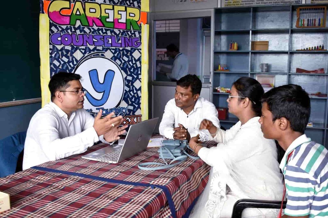 A student of Sunbeam School Ballia in conversation with a counsellor during the career counselling programme