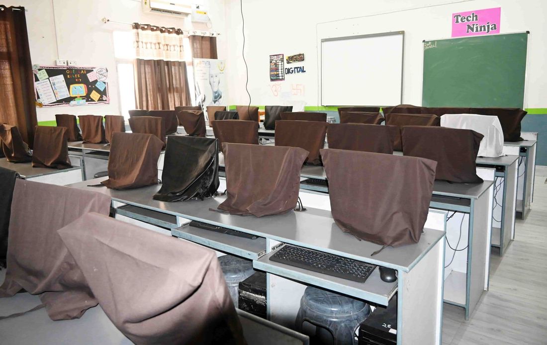 A computer laboratory at Sunbeam School Ballia, machines laid out along the benches