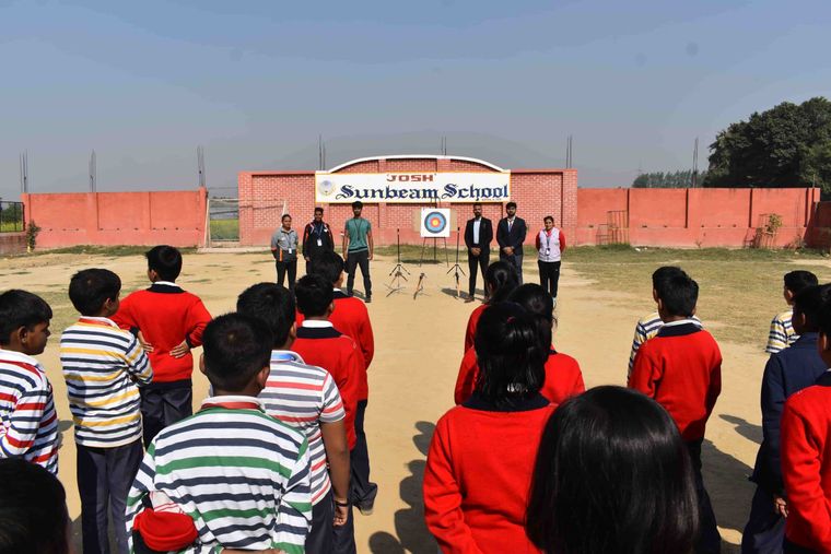 Students of Sunbeam School Ballia on the archery line, at full draw