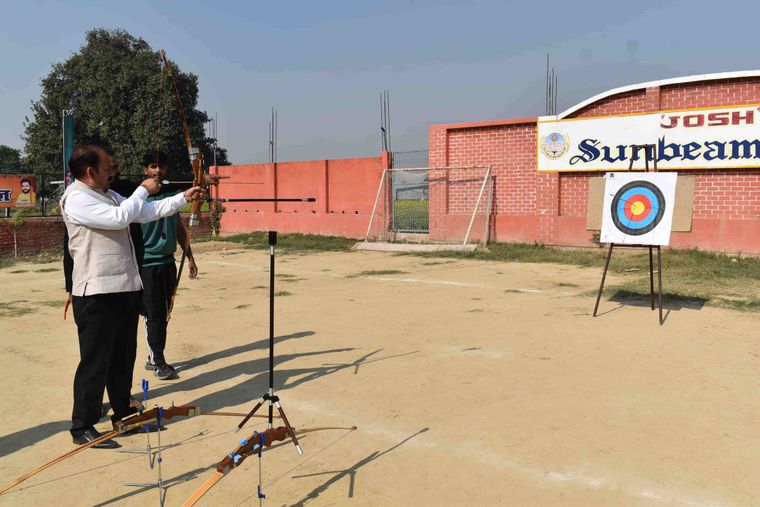 Students of Sunbeam School Ballia on the archery line, at full draw