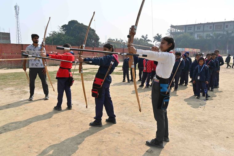 Students of Sunbeam School Ballia on the archery line, at full draw
