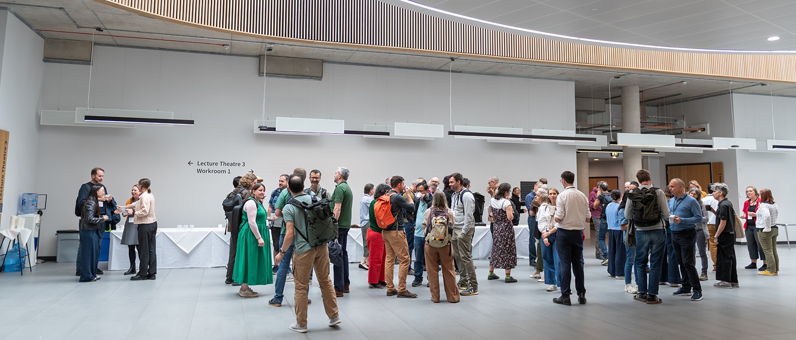 IRSC26 attendees networking in a conference hall