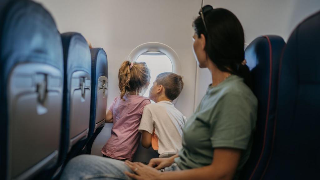 Move to stop charges for parents to sit by children on flights