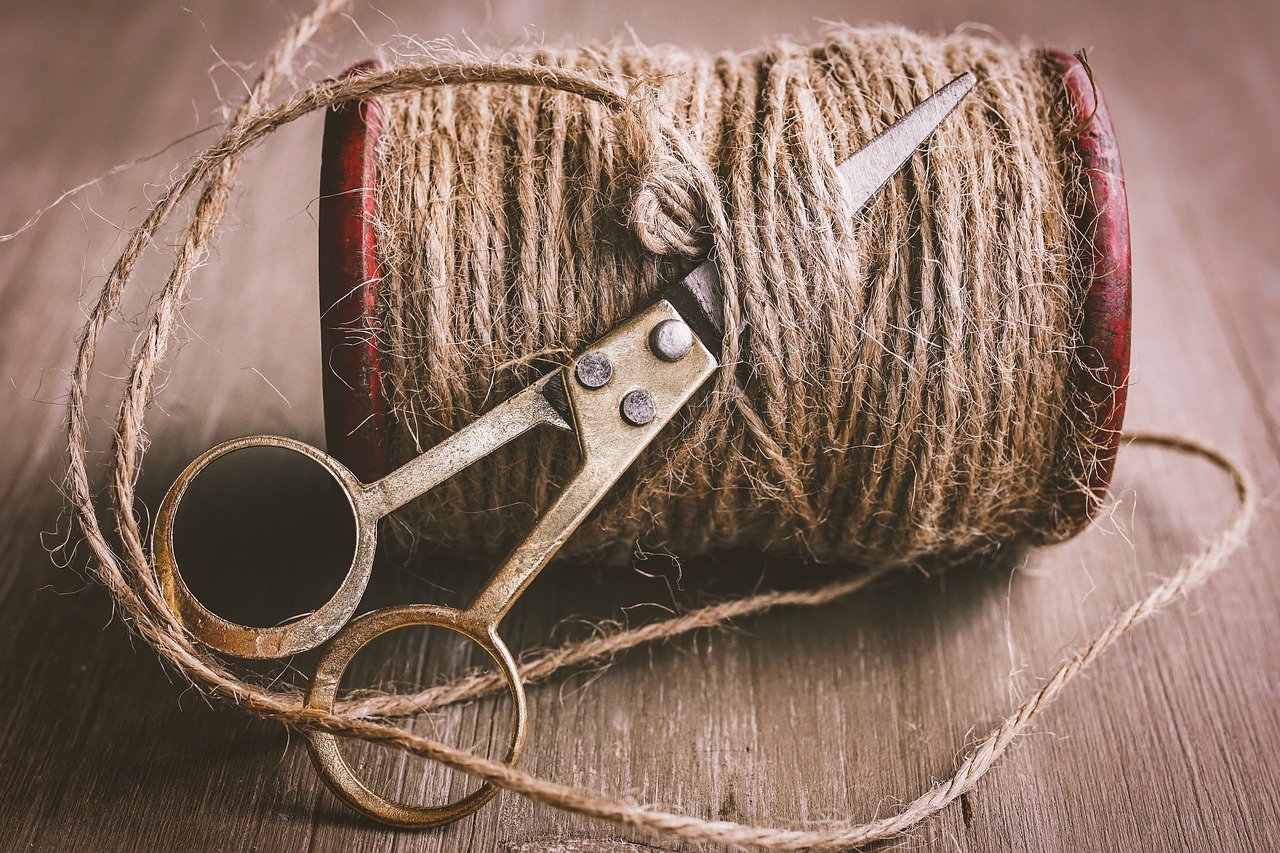 twine wrapping around a pair of scissors