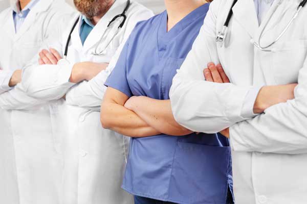 doctors-and-nurses-in-healthcare-team-with-arms