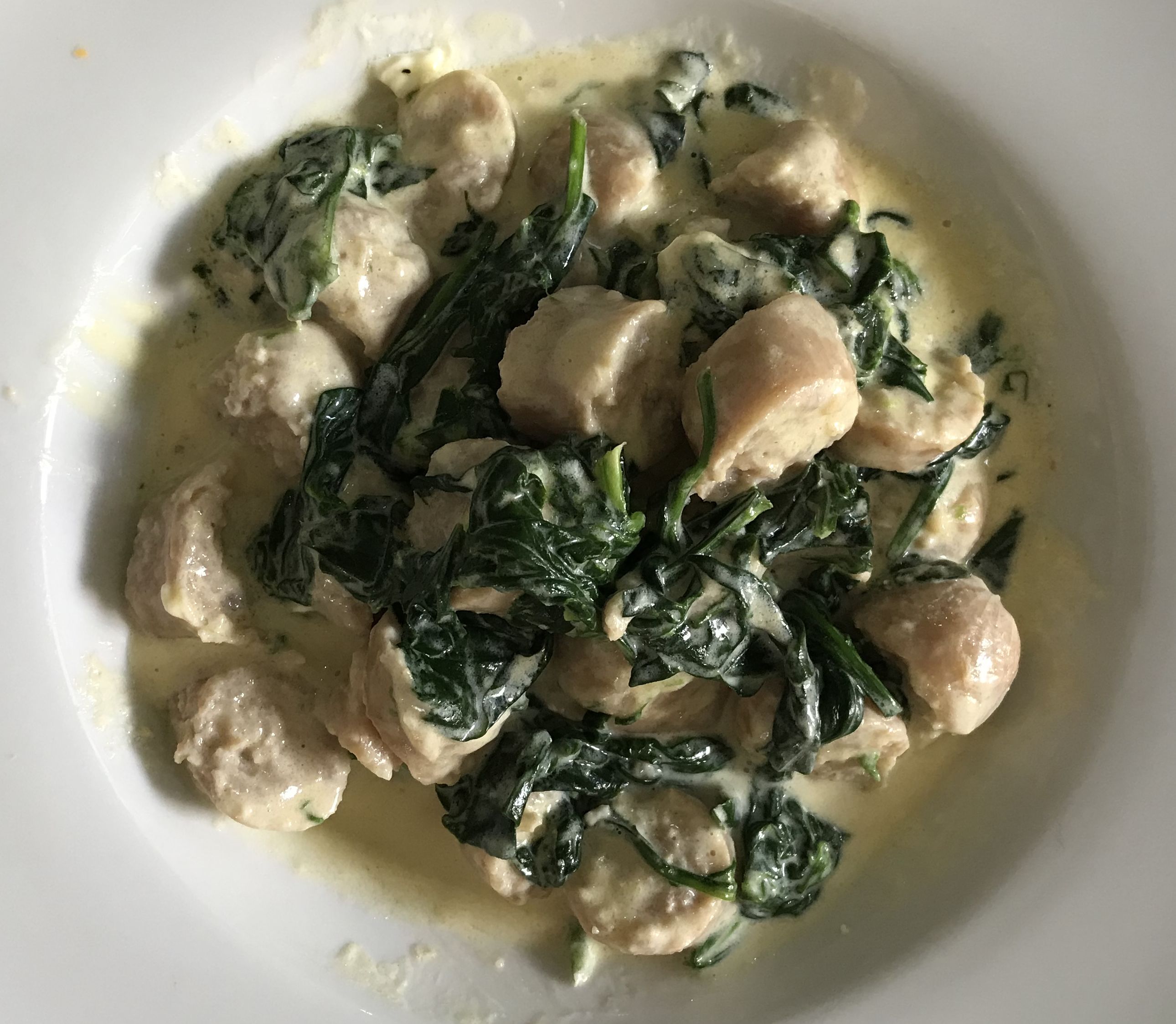 Creamy spinach with pork sausages | bunch