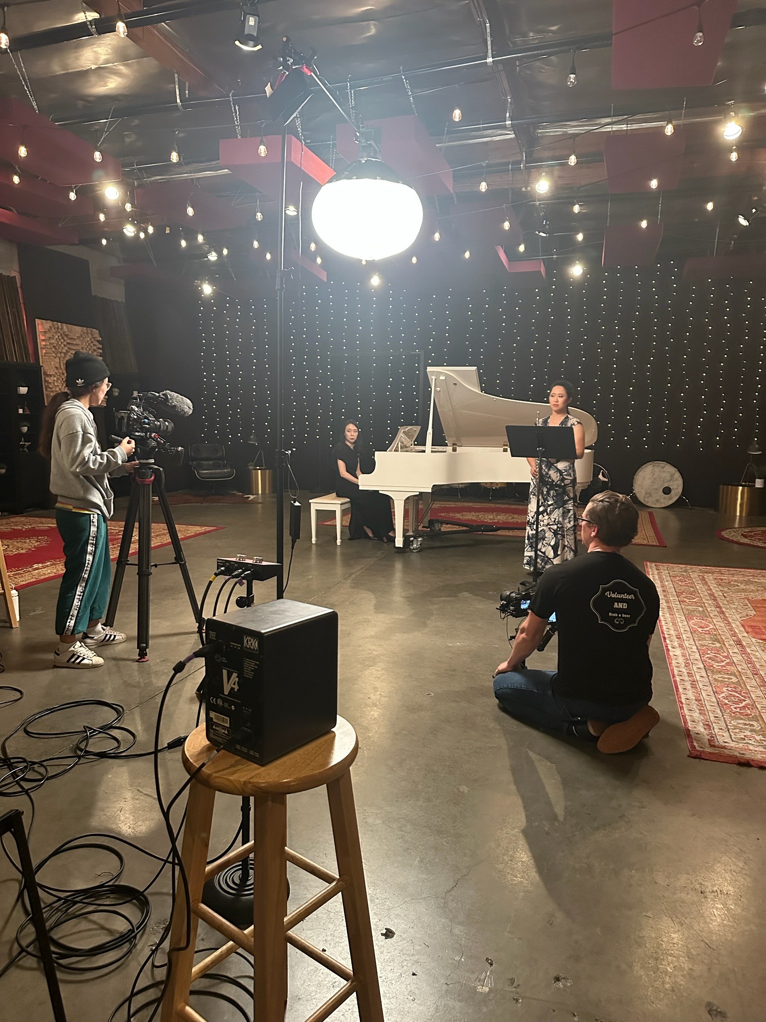 Weili and Yafei preparing for a recorded performance