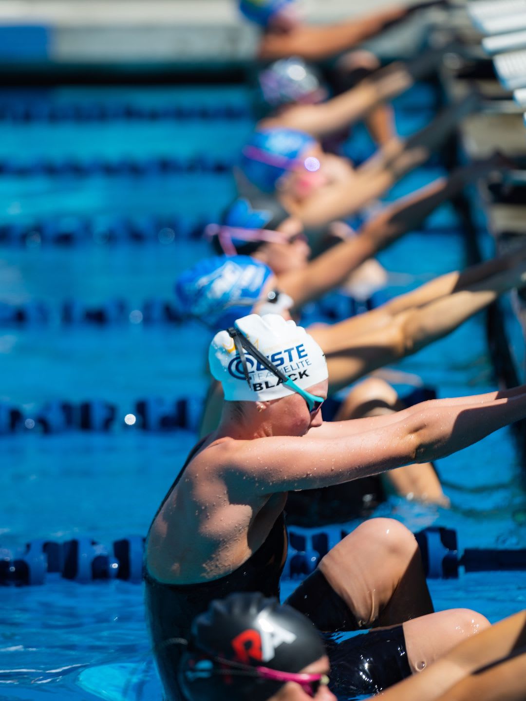 Before School Starts, Young Competitive Swimmers Have Already Finished Practice