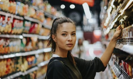 Woman shopping in grocery store