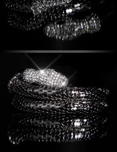 Cosmoda Collection Trendy armband met slangen-print en strass steentjes zilver