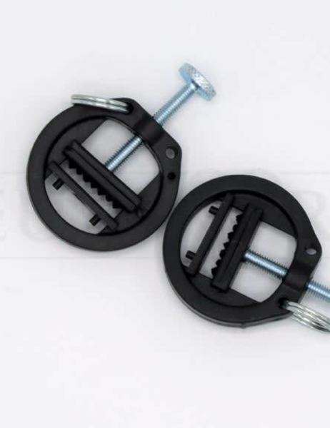 Verstelbare plastic tepelklemmen met ring