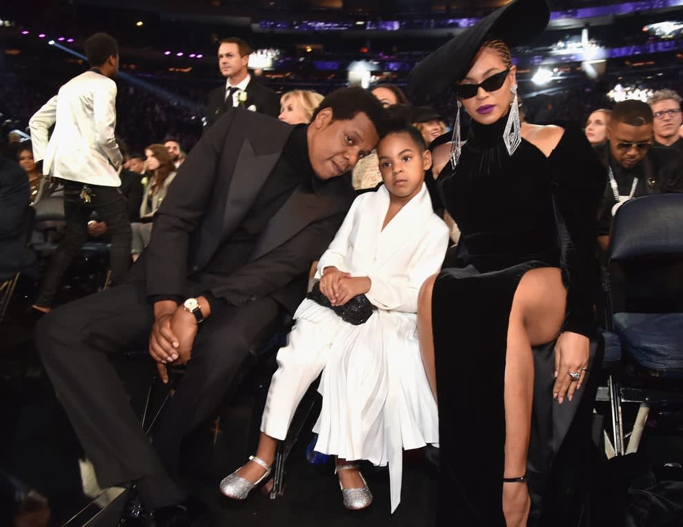 The Carter family in the same outfits