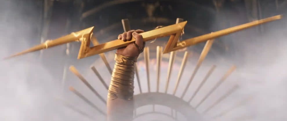 Zeus holding a thunderbolt in "Thor: Love and Thunder"