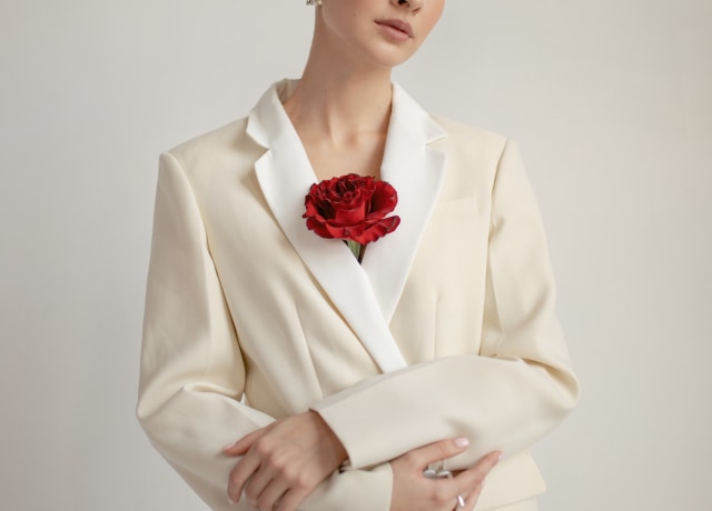 woman wearing white blazer