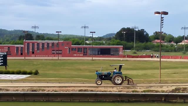 a tractor at the Birmingham dog track a tractor at the Birmingham dog track