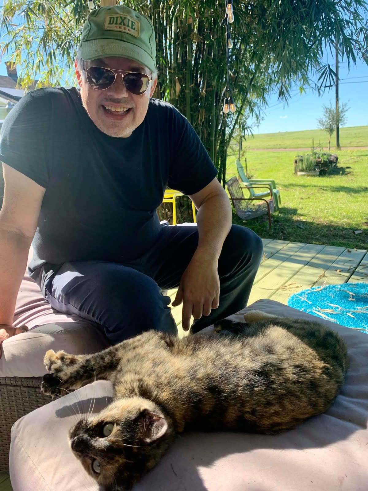 David Rhoden with a cat called Chesh. David Rhoden with a cat called Chesh.