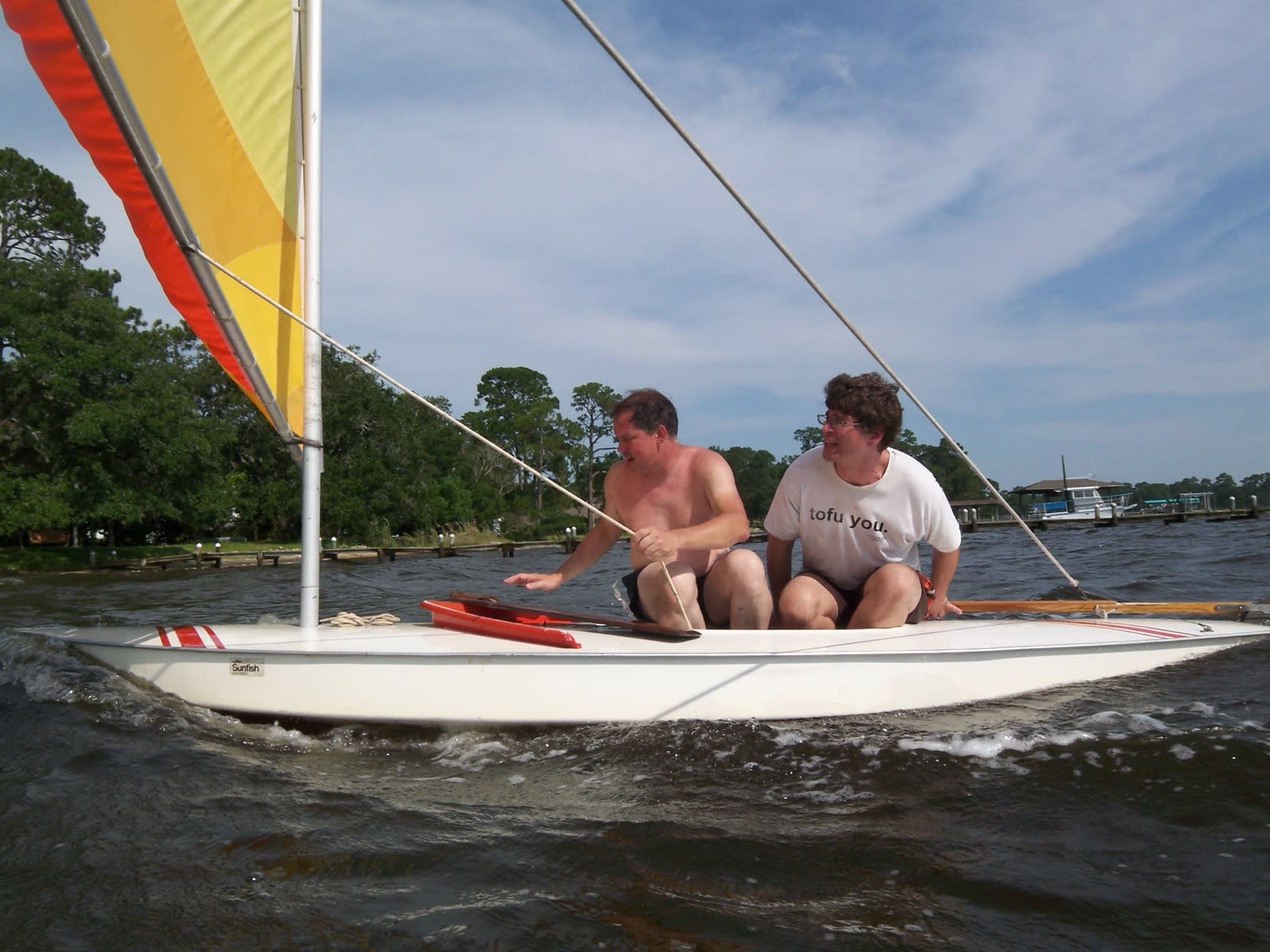 David Rhoden and Trey Ledford sailing a Sunfish in Perdido Bay David Rhoden and Trey Ledford sailing a Sunfish in Perdido Bay